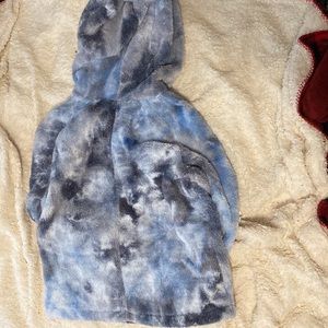Sweatshirt that is blue and gray with white drawstrings